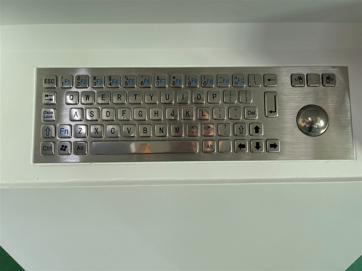 Kiosk stainless steel keyboard with trackball